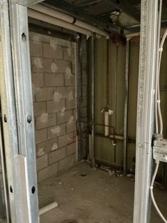 Shower framing at block wall