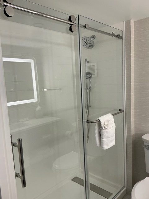 Frameless glass shower installed
