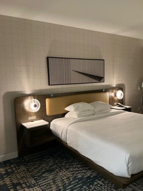 Finished king room with bench and art